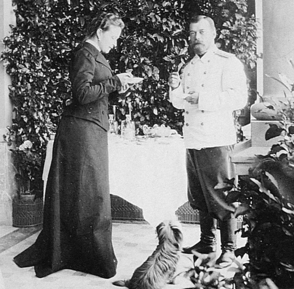 Ella and Nicky at tea, with a cute little yorkie, 1902.