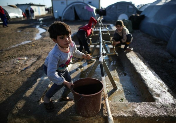 © Leanne Burden Seidel/www.bostonglobe.com Сирийские дети-беженцы из города Кобани в лагере, в городе Суруч, Турция.