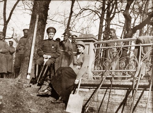 Emperor Nicholas II reading official documents on the balcony of the Alexander P