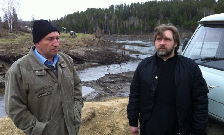 Божественная Литургия в селе Мартюши, отрезанном наводнением от живых и от мёртвых (Фото)