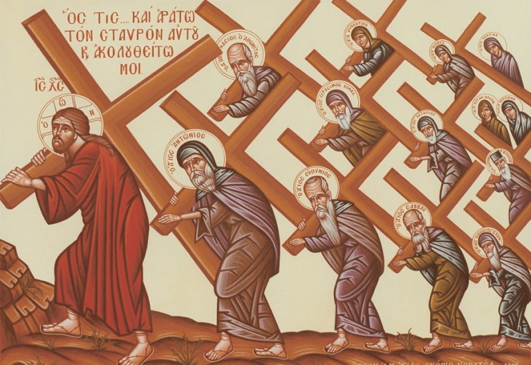 Монах несет крест