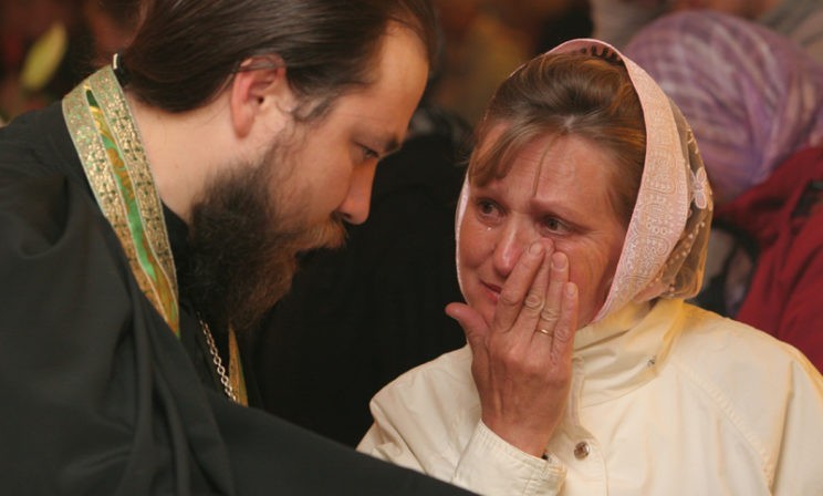 Священник и горе